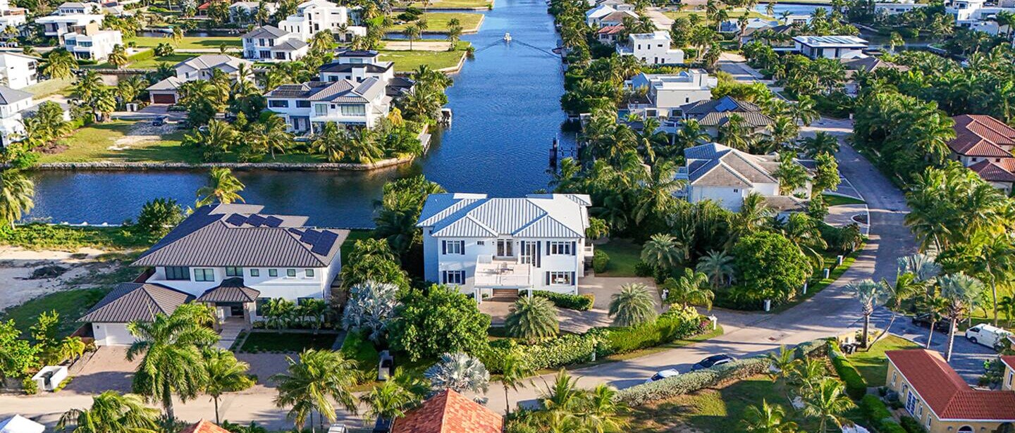 Aerial shot looking down the canal over the villa.