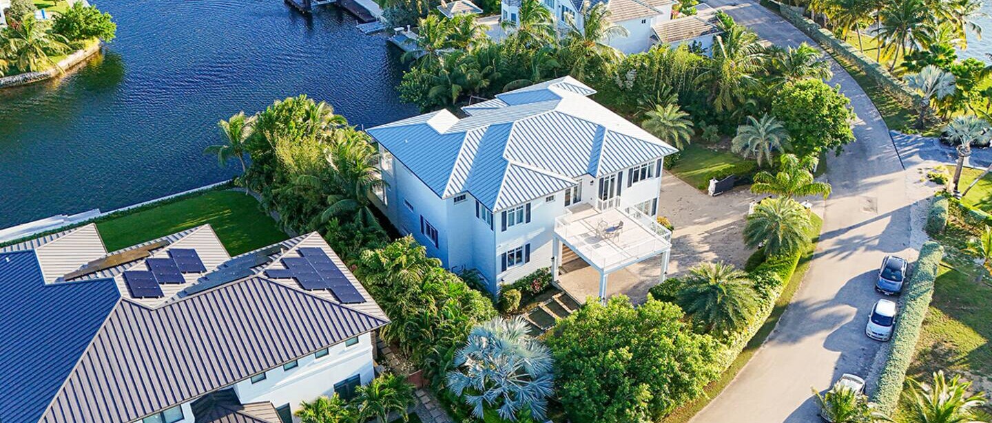 Aerial shot of the villa and drive way.