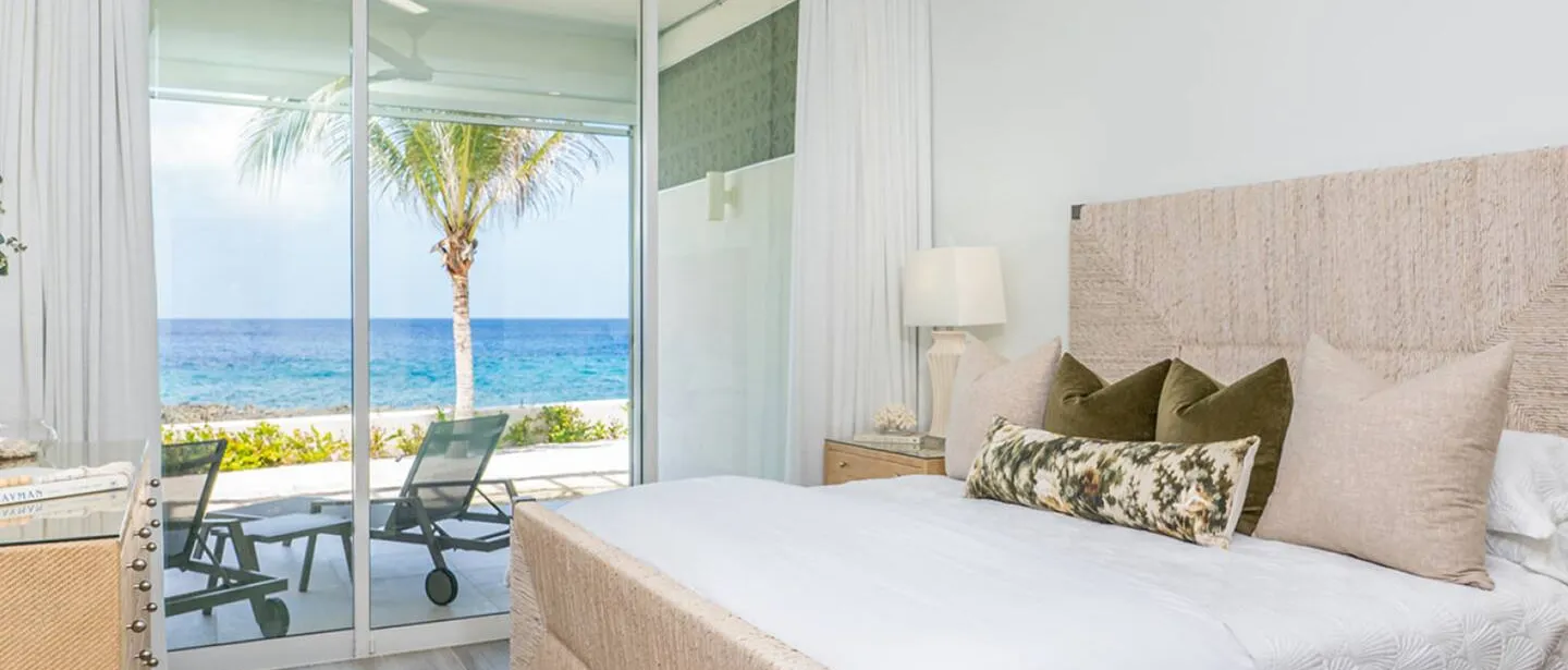 The master bedroom has ocean views and you can step right out on to the patio.