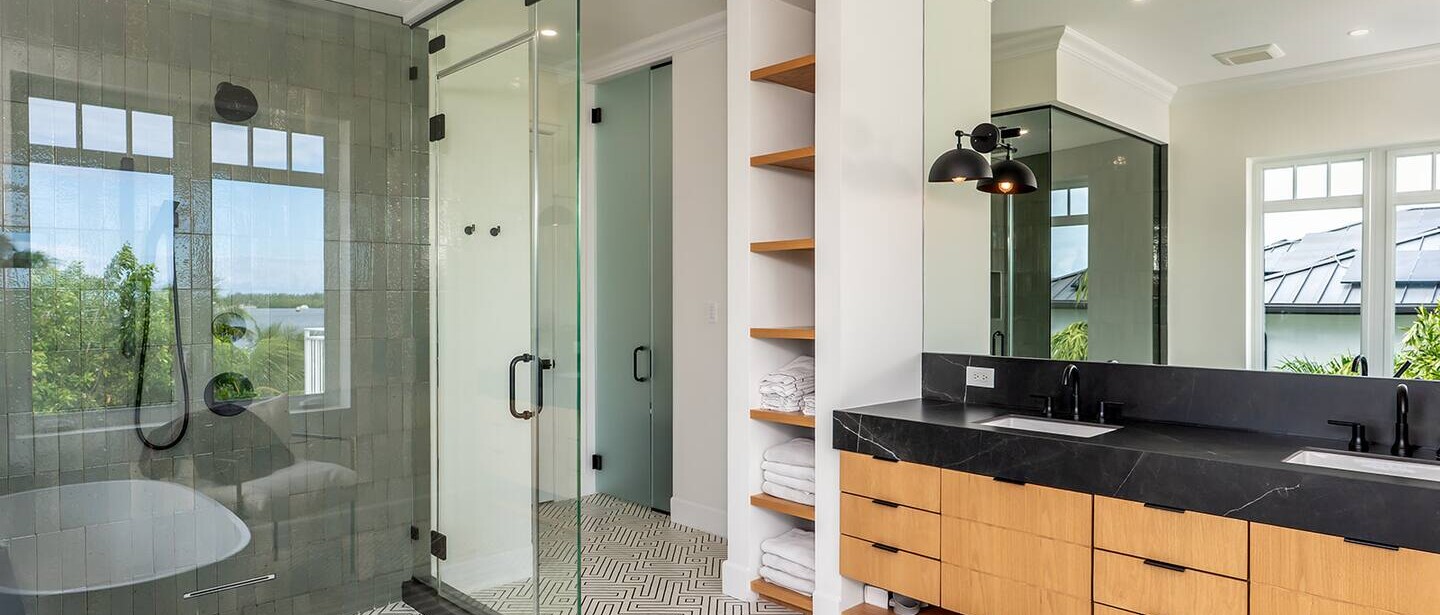 Master bathroom with Japanese style toilet and steam room shower.
