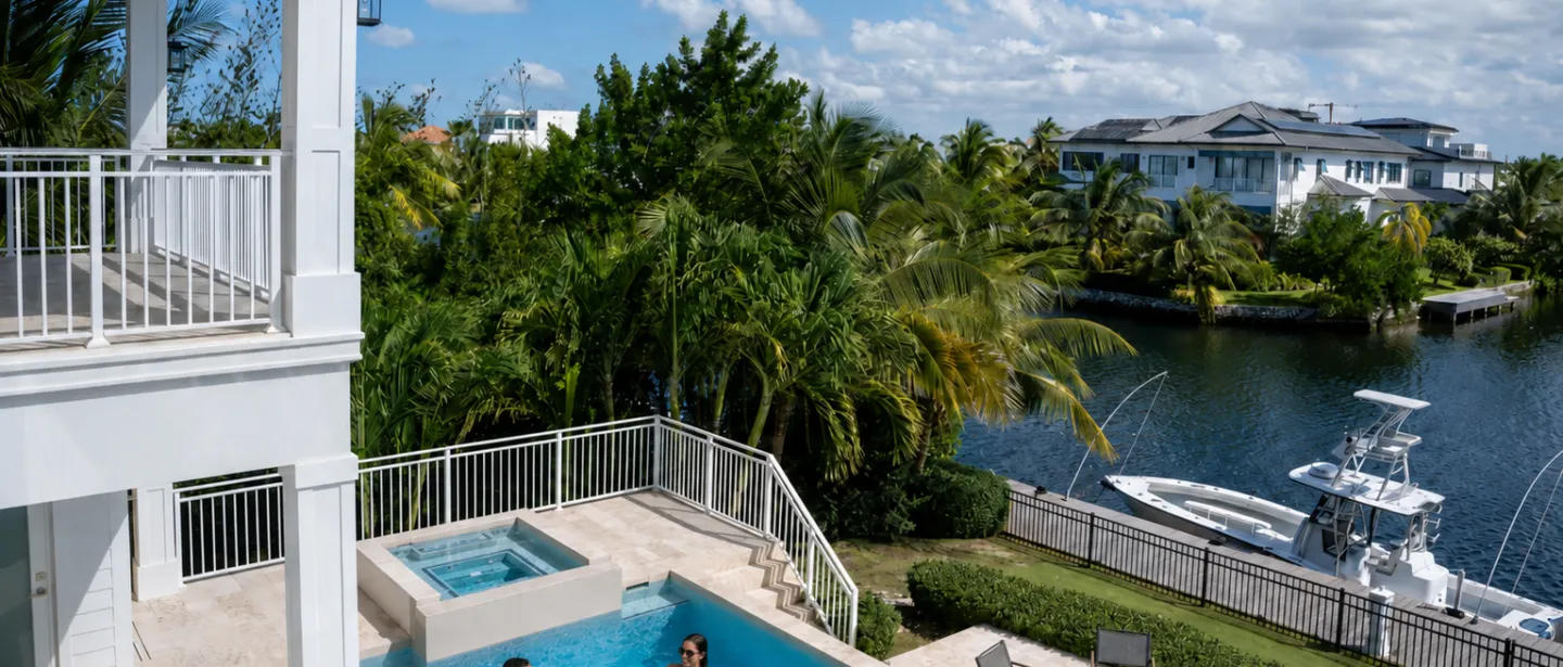 Private waterfront pool & spa with tropical views and canal access.
